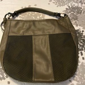 Olive green tote bag with leopard print interior
